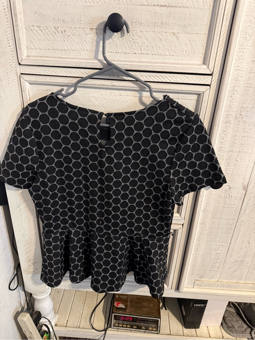 Elle Black Circle-Pattern Peplum Short-Sleeve Top